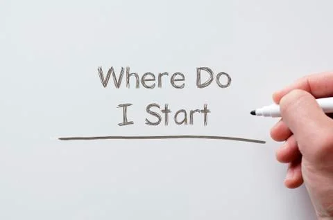 Where do i start written on whiteboard Stock Photos