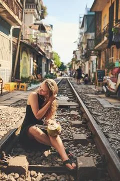 This is where I learned about the benefits of coconuts. a woman having coconut Stock Photos