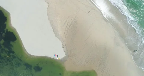 Where River Meets The Ocean on a Sandy Beach] The Concept of Nature Stock-Footage 331987823