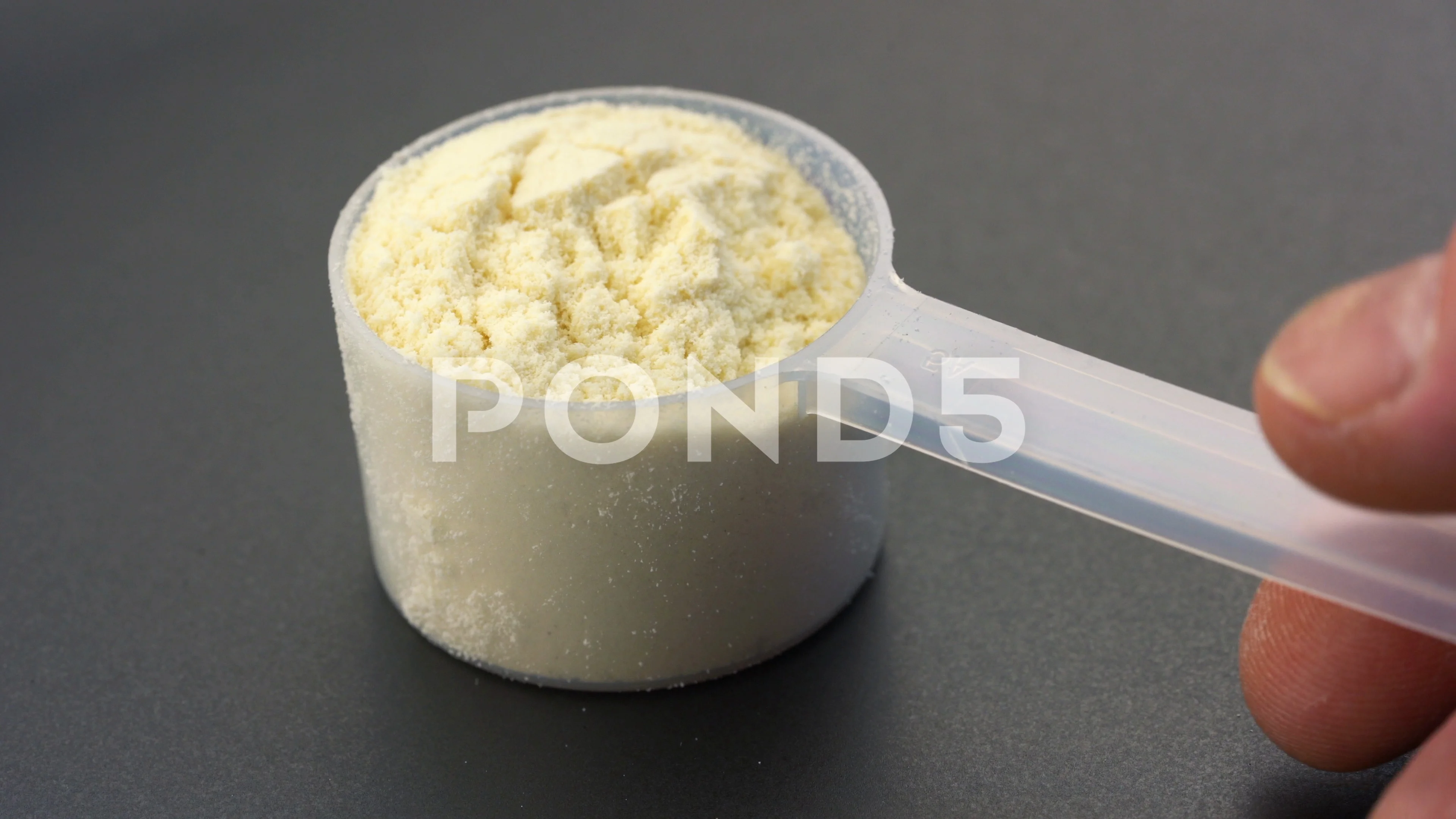 Whey Protein Powder in measuring scoop. Stock Photo by  ©thaiprayboy@hotmail.com 166591318