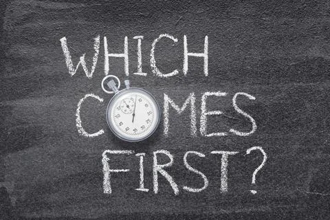 Which comes first watch Stock Photos