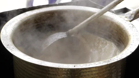 A Whiff of Indian Elegance - The Art of Tea Stirring Stock Footage 315865337