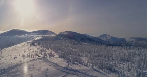 While ascending with a snow cat during a day of cat skiing Stock Footage 119076370