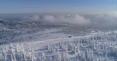 While ascending with a snow cat during a day of cat skiing Stock Footage 119076481