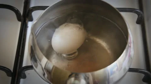 While boiling eggs is a must for a healthy breakfast. Video stock 151392855