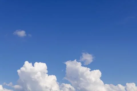 While Clouds over Blue Sky Background Stock Photos