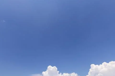 While Clouds over Blue Sky Background Stock Photos