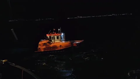 While rescuing a rescue boat that fell into the sea Stock Footage 223577251