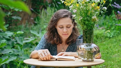 While sitting in the backyard of a village house. Stock Footage 246173766