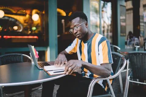 While spending time for project research via modern laptop computer, freelance Stock Photos