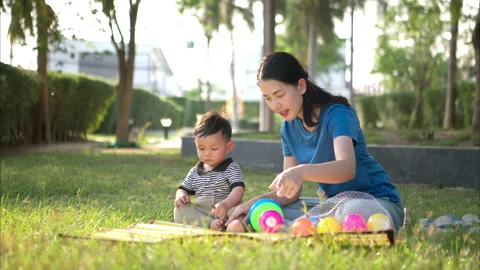 While in vacation at home, a mother engages in activities Stock Footage 310111296