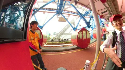 While waiting for the turn in the ferris wheel in Osaka Japan Stock Footage 129279218