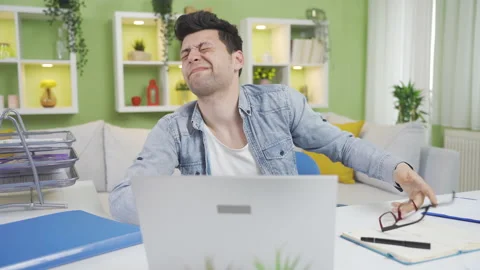 While wearing his clumsy home office emp... | Stock Video | Pond5