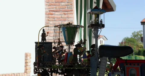 Whimsical Mechanical Bicycle: A Moving Miniature World of History Stock Footage 305702425