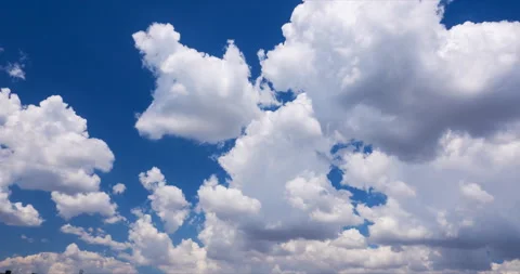 Whimsical shapes of the clouds in the sky in high winds Stock Footage 92576495