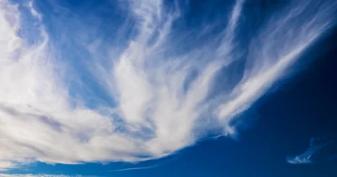 Whimsical shapes of the clouds in the sky in high winds Stock Footage 118964614