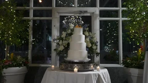 A Whimsical Wedding Cake featuring Adorable Rubber Duck Toppers that delight 스톡 동영상 316511422