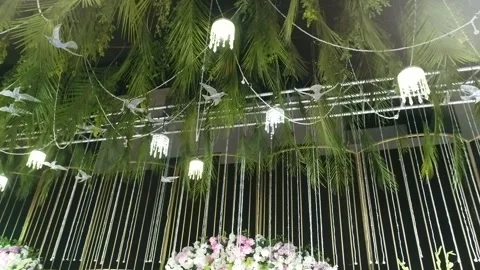 "Whimsical Wedding Ceiling Decor with Chandeliers and Hanging Birds" Video stock 327901776