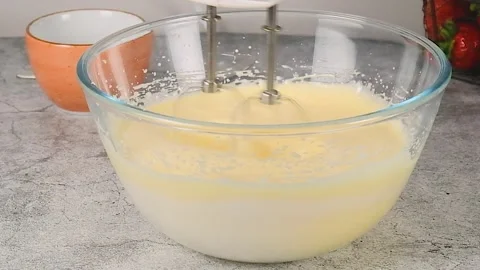 Whip the cream for the cake Stock Footage 256606511