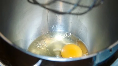 Whip the eggs in a container Stock Footage 91549044