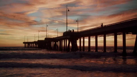 Whip Tilt Down Into Venice Beach Pier Sunset 4K 48FPS SLO-MO Stock Footage 223459408