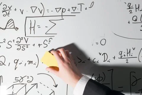 Whiping the whiteboard. Complex math formulas. Mathematics and science Foto stock