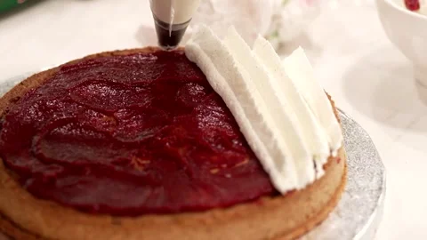 Whipped cream on the cake Stock Footage 269980442