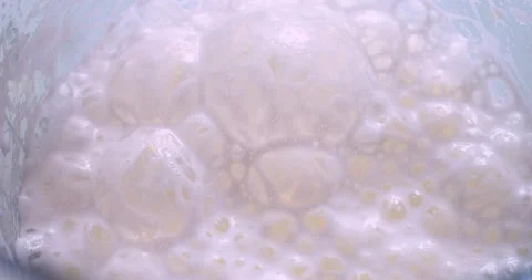 A whipped milkshake in a plastic cup Stock Footage 333579146