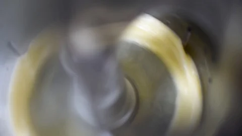 Whipping chicken eggs in a food processor for dough preparation Stock Footage 91081005