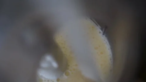 Whipping chicken eggs in a food processor for dough preparation Stock Footage 91081007