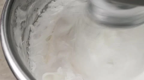 Whipping cream or egg whites for cooking Macaroons Stock Footage 62425574
