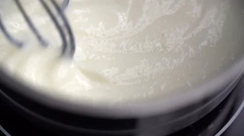 Whipping custard, slow motion 스톡 동영상 64747573