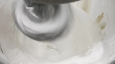 Whipping an egg whites by professional mixer Stock Footage 62425590
