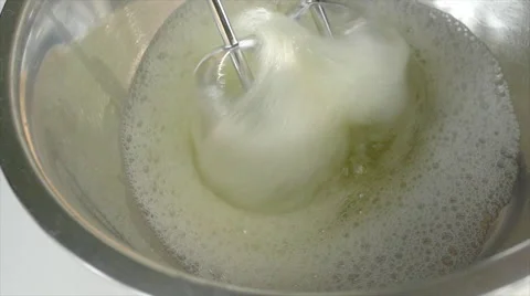 Whipping egg whites, slow motion, 4k Stock Footage 63298229