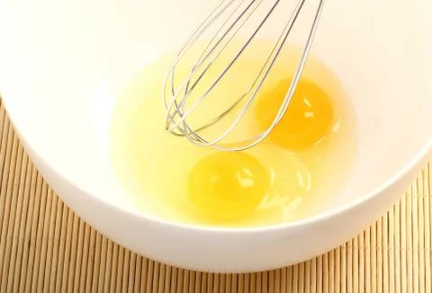 Whipping eggs Foto stock