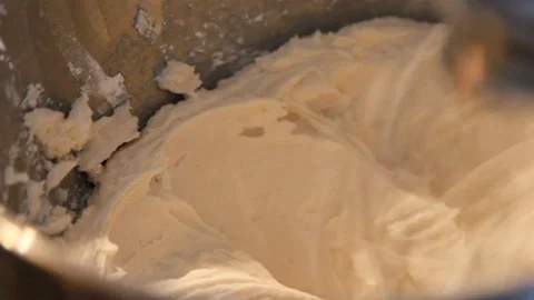 Whipping icing in bakery Stock Footage 100616519