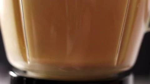 Whipping mango yogurt, for making a traditional lassie drink Stock Footage 170452136