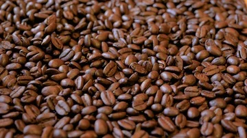 Whirling Coffee Grains Background, Close-up Rotation Heap Of Beans 4K Stock Footage 86115846