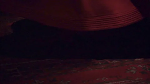 Whirling Dervish performing Sufi dance in the darkness Stock Footage 336302864