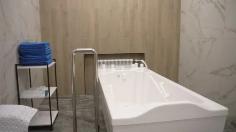 Whirlpool Bath for Hydromassage, Jacuzzi in Spa. Procedure for relaxation Stock Footage 295139985