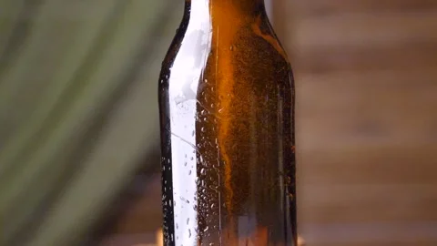 Whirlpool in a beer bottle, slow motion Stock Footage 88582996