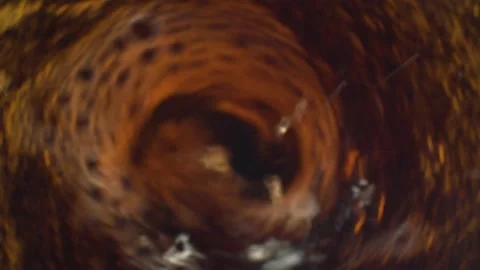 Whirlpool in the cola or dark beer Stock Footage 134726927