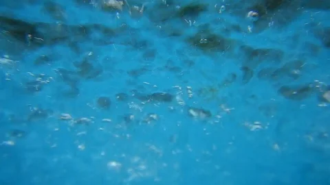 Whirlwind of bubbles and bubbling in a blue liquid Stock Footage 109290529