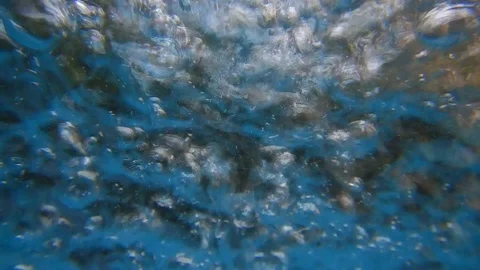 Whirlwind of bubbles in a blue liquid Stock Footage 109290793