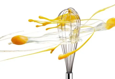 Whisk beating eggs Stock Photos