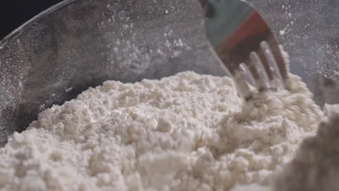 Whisk flour with fork slow motion 스톡 동영상 149944946