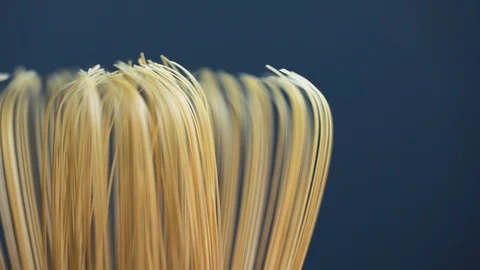 Whisk for matcha tea at grey background Stock-Footage 119120619