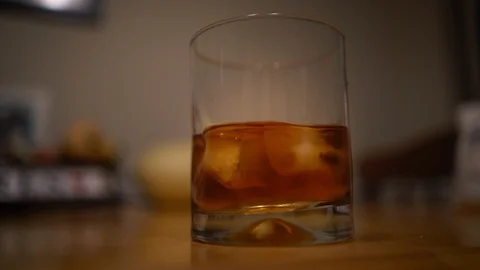Whiskey and Ice on Table Stock Footage 97277103