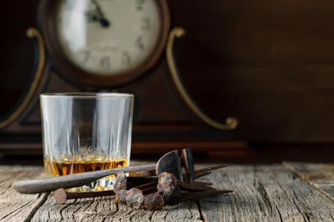 Whiskey and old rust tools Stock-Fotos
