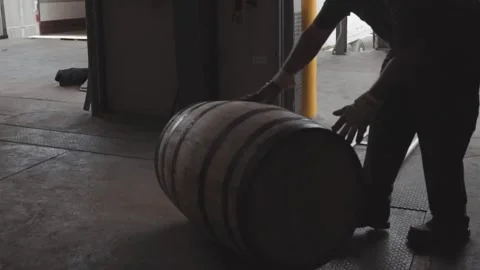 Whiskey Bourbon Barrels Being Dumped and Poured  Stock Footage 240028210